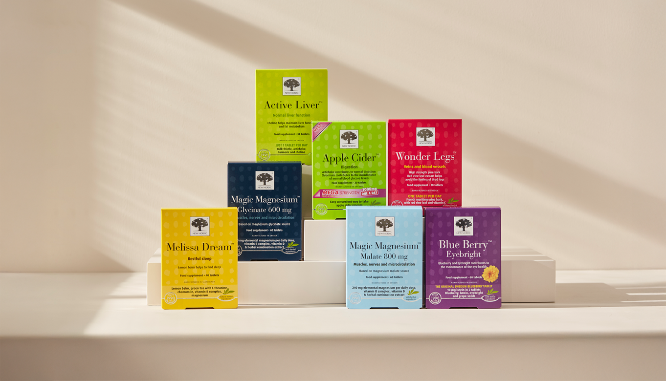 Différents produits New Nordic présentés dans leurs emballages colorés distinctifs.
