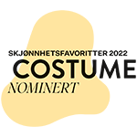 Badge van Costume Skjønnhetsfavoritter 2022 nominatie met gestileerde grafische achtergrond.