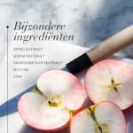 Doorgesneden appel met overzicht van de belangrijkste ingrediënten in Hair Volume™ Gummies.