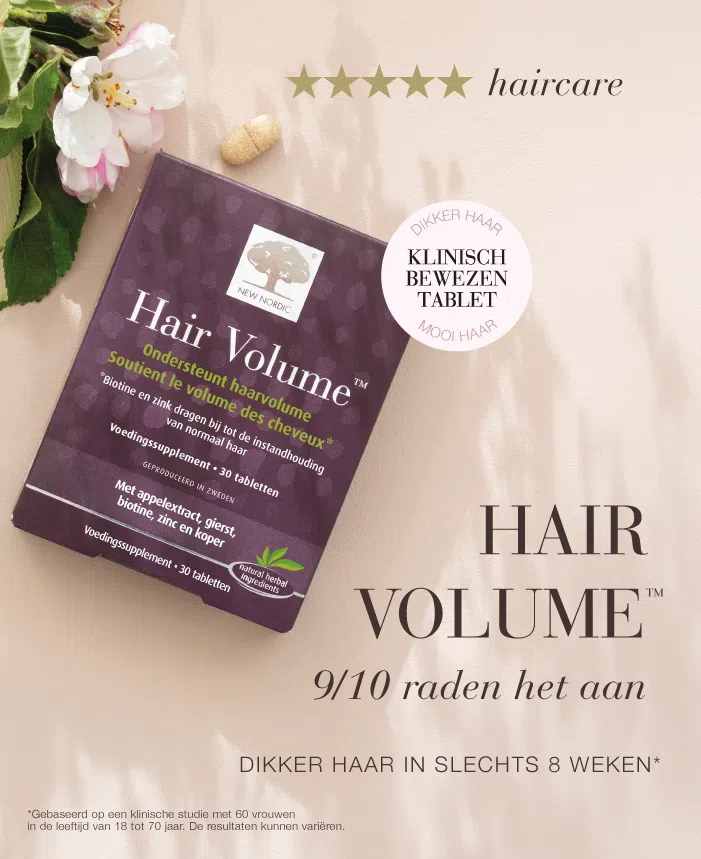 Hair Volume™ verpakking met bloemen en tablet, met tekst "Haircare en 9 op 10 raden het aan".