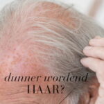 Close-up van dunner wordend grijs haar met de tekst "dunner wordend haar?".