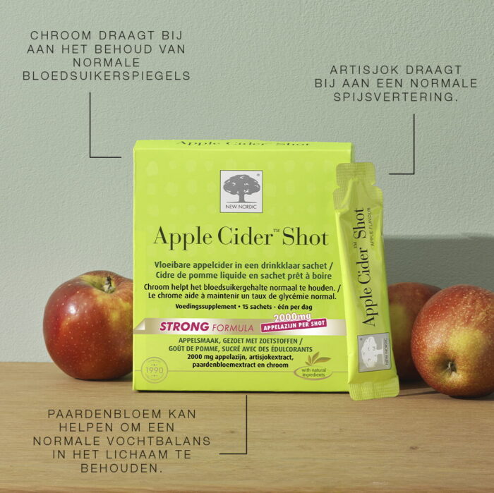 Apple Cider™ Shot met sachet en appels.